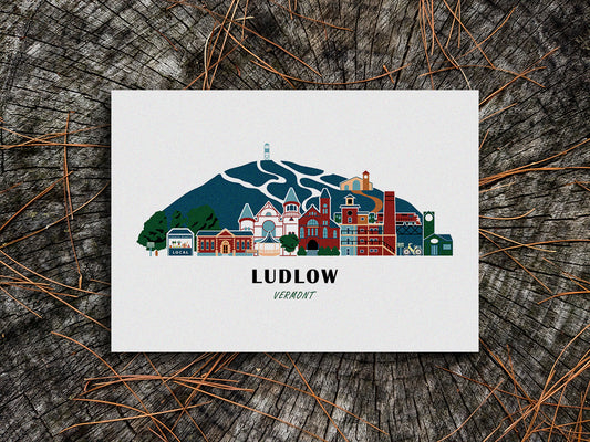 Art print of buildings arranged in a skyline with the text Ludlow Vermont