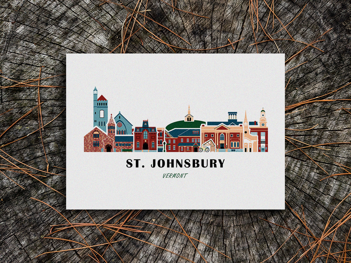 Art print of buildings arranged in a skyline with the text St. Johnsbury Vermont
