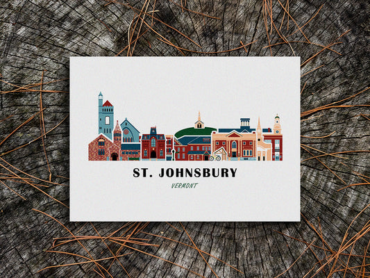Art print of buildings arranged in a skyline with the text St. Johnsbury Vermont