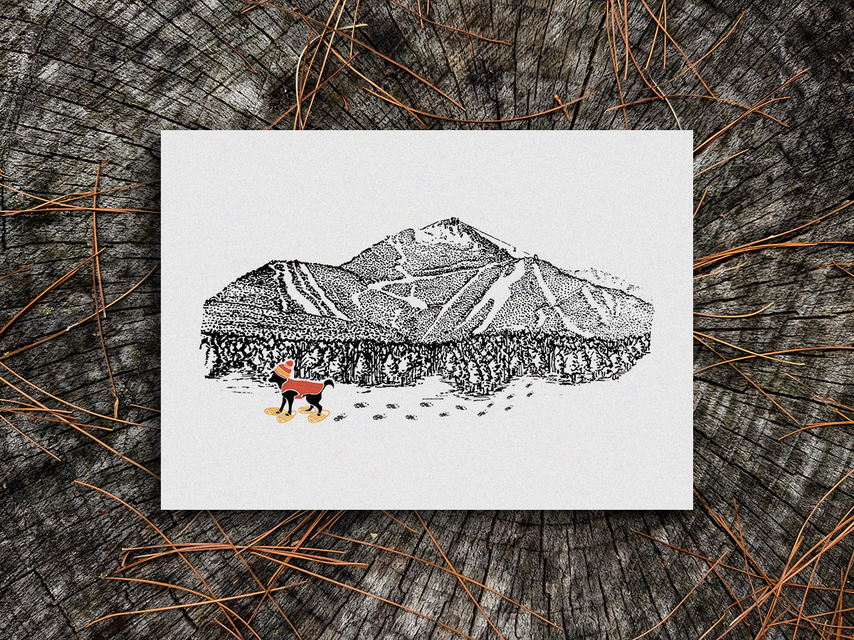 Art print of a dog with a red vest and hat snow shoeing with mountains in the background
