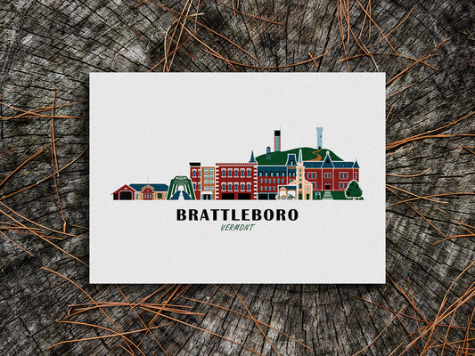 Art print of buildings arranged in a skyline with the text Brattleboro Vermont
