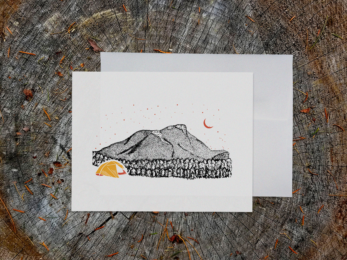 Greeting card with an image of a mountain and bright yellow tent under a starry sky.