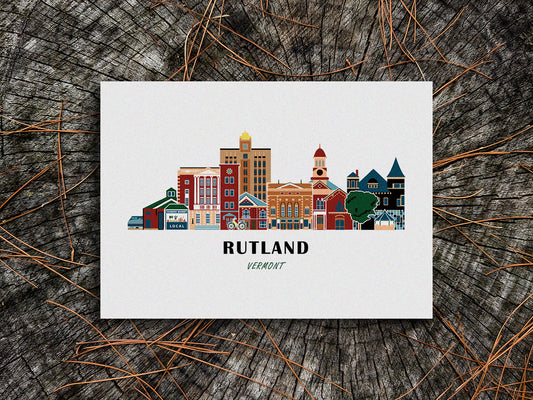 Art print of buildings arranged in a skyline with the text Rutland Vermont