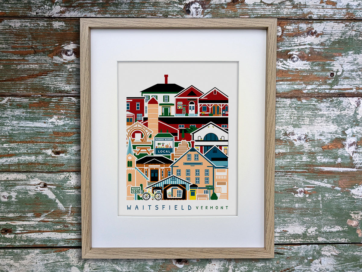 Framed vertical poster with buildings and landmarks in a stacked arrangement with the text Waitsfield Vermont.