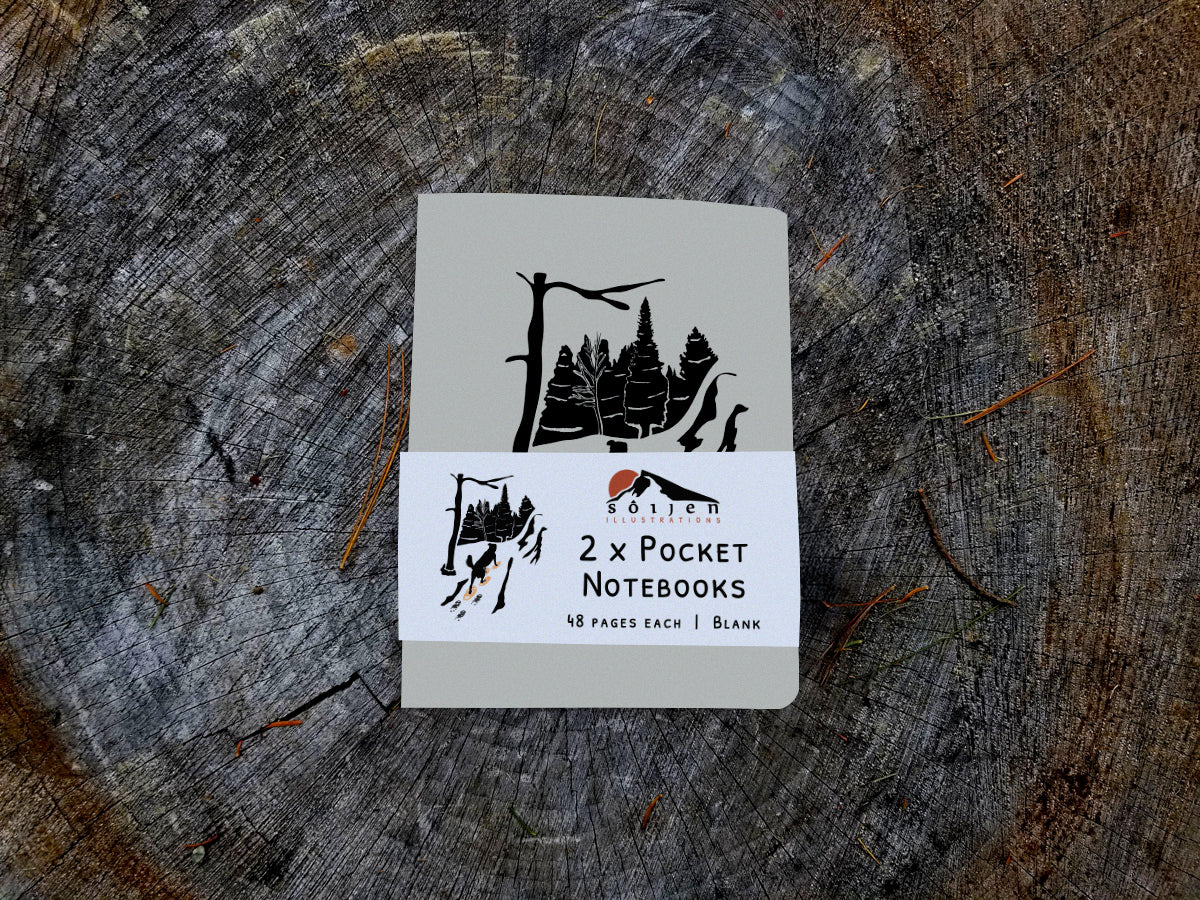 Notebook with illustration of a dog snowshoeing