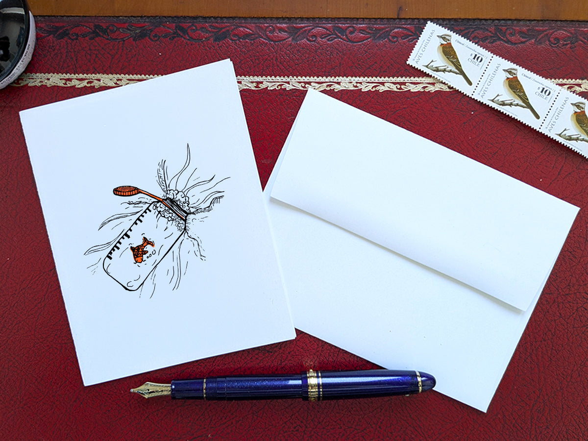 White card with a black ink drawing of a water bottle with red fish on a red surface with a pen, envelope and stamp.