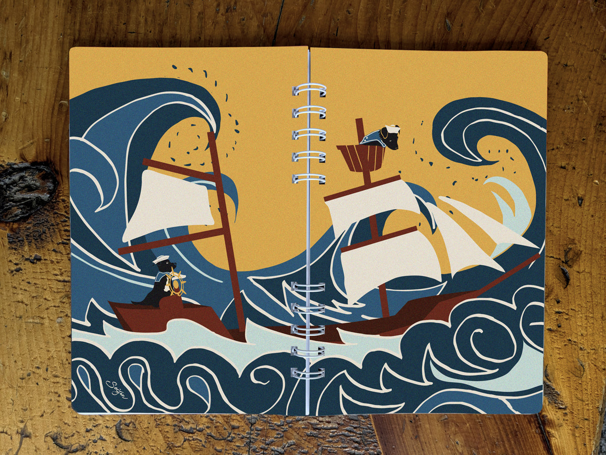 Notebook with illustration of ship sailing through large waves with dog onboard on a table.