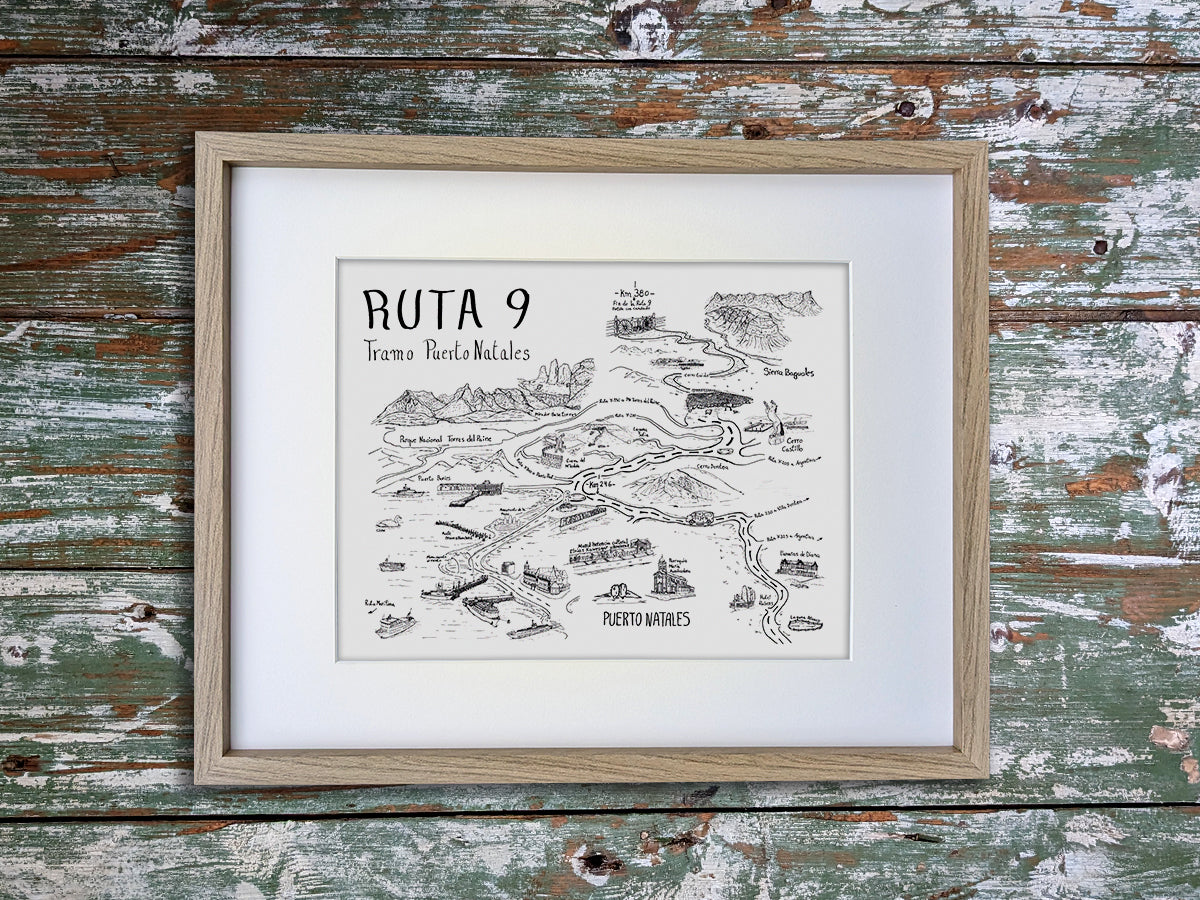 Framed black and white ink illustrated map with title Ruta 9 Tramo Puerto Natales of buildings, mountains and roads along scenic Route 9 of Patagonia Chile.