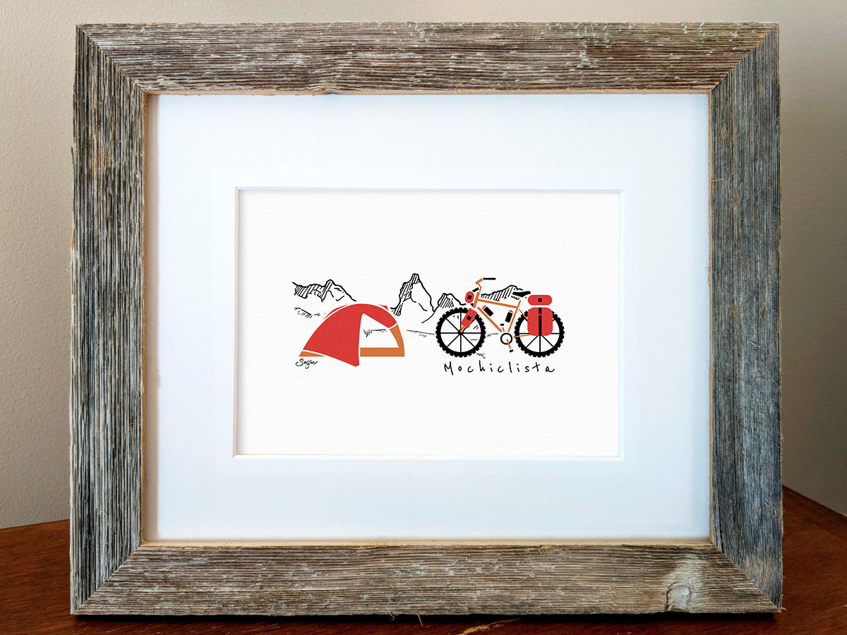 Framed art print of a red and orange bike and tent with mountains in the background and the text Mochiclista