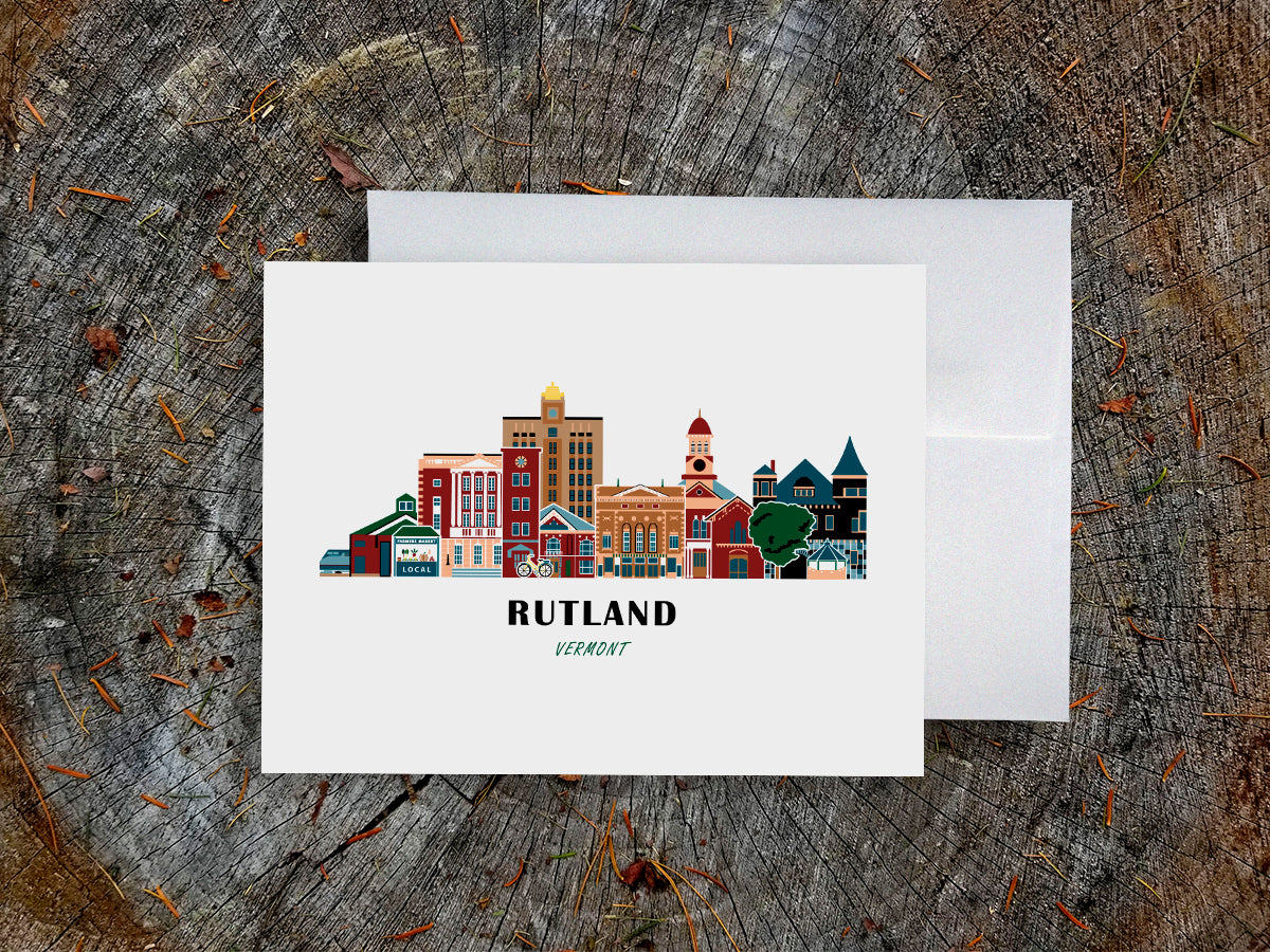 Greeting card with image of buildings arranged in a city skyline with the text Rutland Vermont