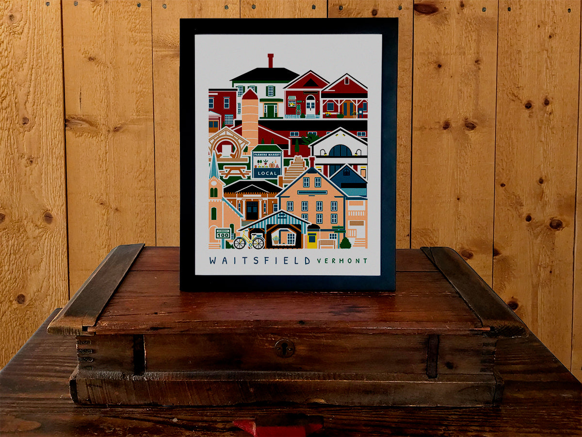 Framed vertical poster with buildings and landmarks in a stacked arrangement with the text Waitsfield Vermont.