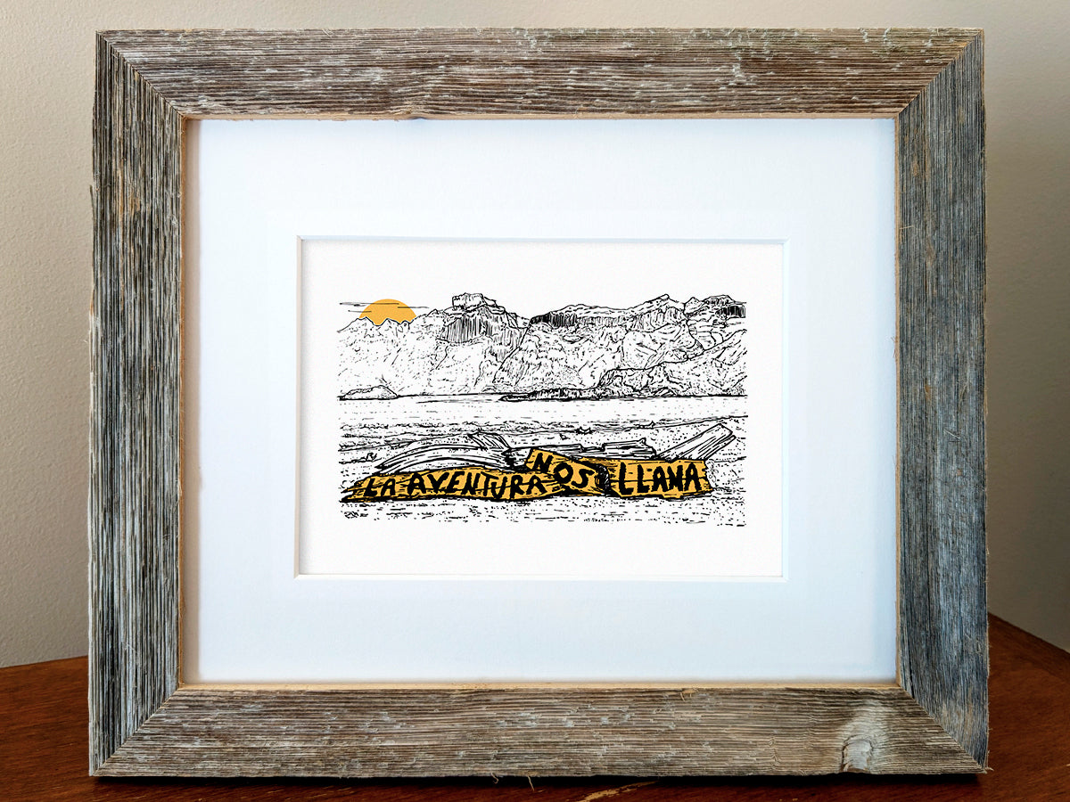 Framed art print of mountains and sunset with the text La aventura nos llama