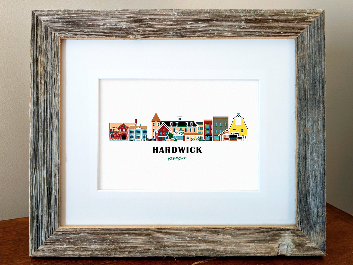 Framed art print of buildings arranged in a skyline with the text Hardwick Vermont