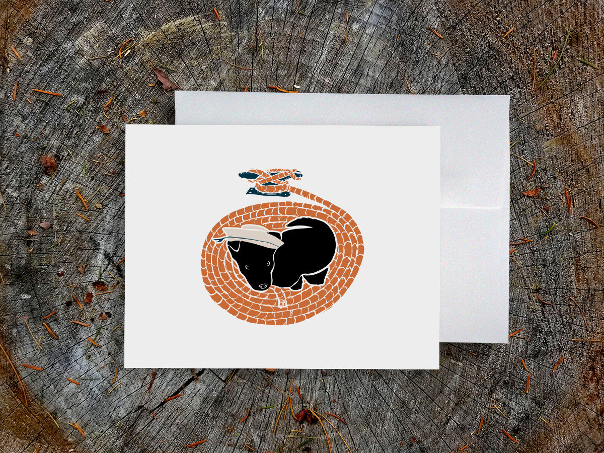 Greeting card with image of a dog with a sailor hat surrounded by rope