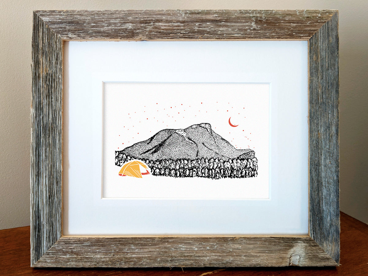 Framed art print of a yellow and orange tent with a mountain in the background and starry night sky