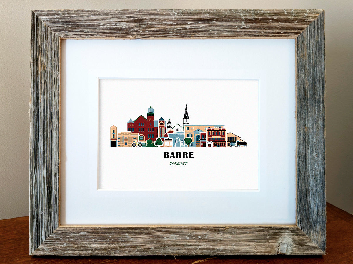 Framed art print of buildings arranged in a skyline with the text Barre Vermont