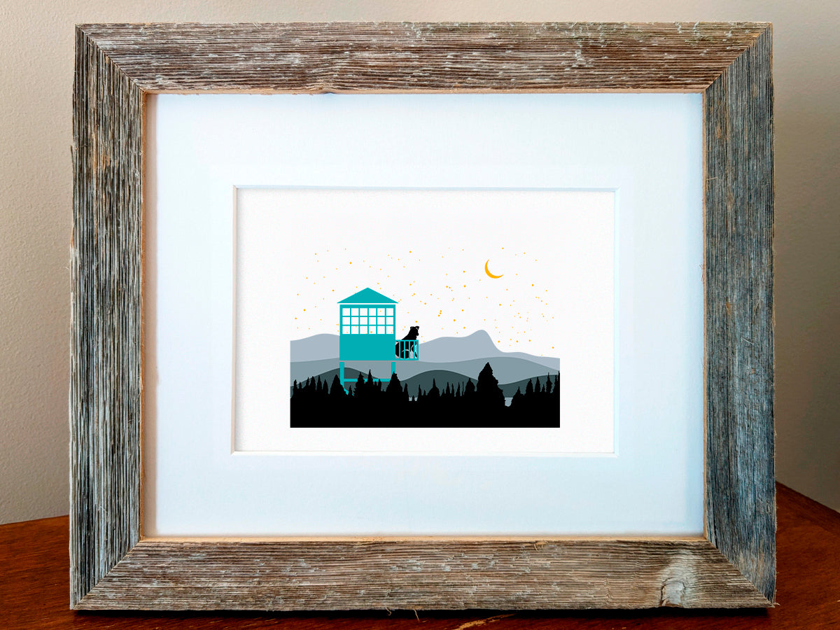 Framed illustration of a dog in a fire tower overlooking the mountains.