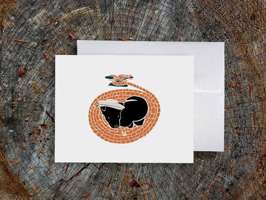 Greeting card with image of a dog with a sailor hat surrounded by rope