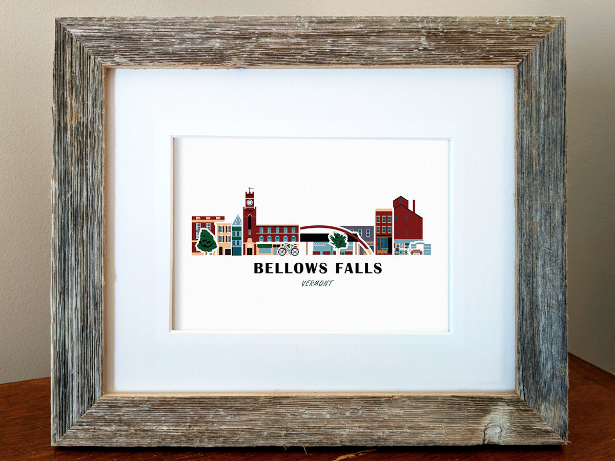 Framed art print of buildings arranged in a skyline with the text Bellows Falls Vermont