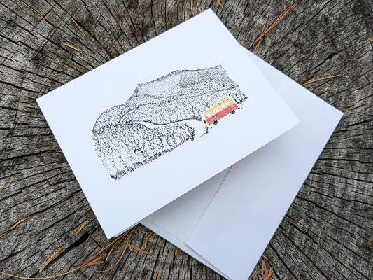 Greeting card with image of a mountain road and bright campervan.