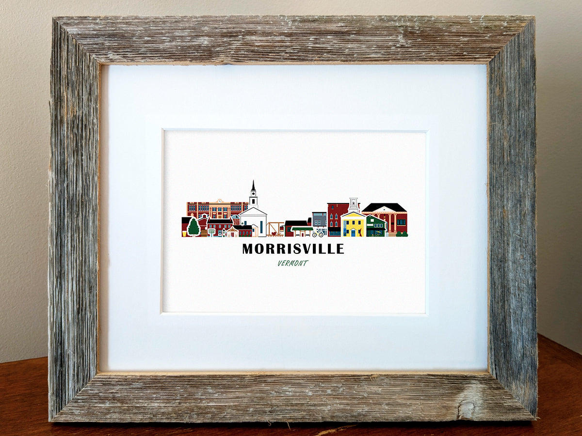 Framed art print of buildings arranged in a skyline with the text Morrisville Vermont